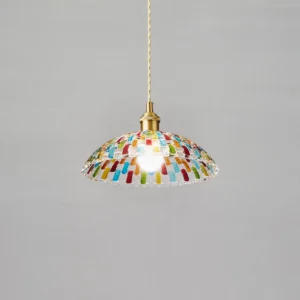 Kaleido stained glass pendant lamp three-quarter view showing exposed E26 E27 bulb, colorful glass mosaic dome shade with brass hardware