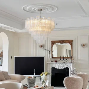 Kamenicky cascading clear glass tube chandelier illuminated in luxury neoclassical living room with fireplace