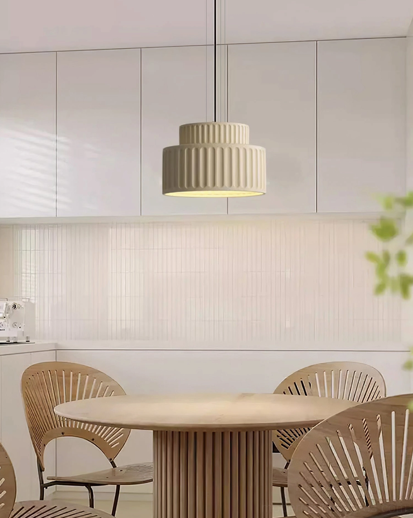 Kami ribbed pendant fixture in Scandinavian modern interior, illustrating design compatibility with minimalist decor
