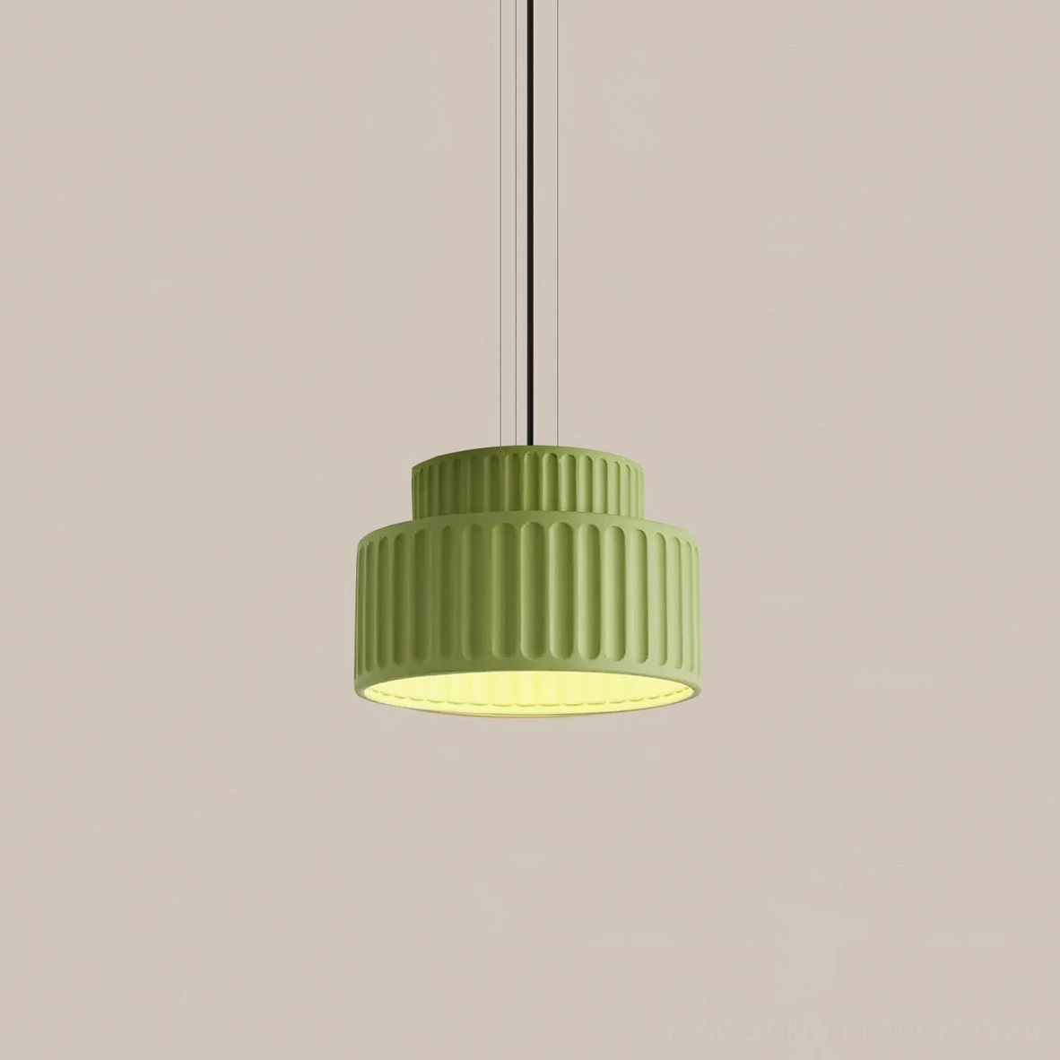 Green Kami pendant lamp with sage finish, showing ribbed cylindrical shade in modern minimalist style