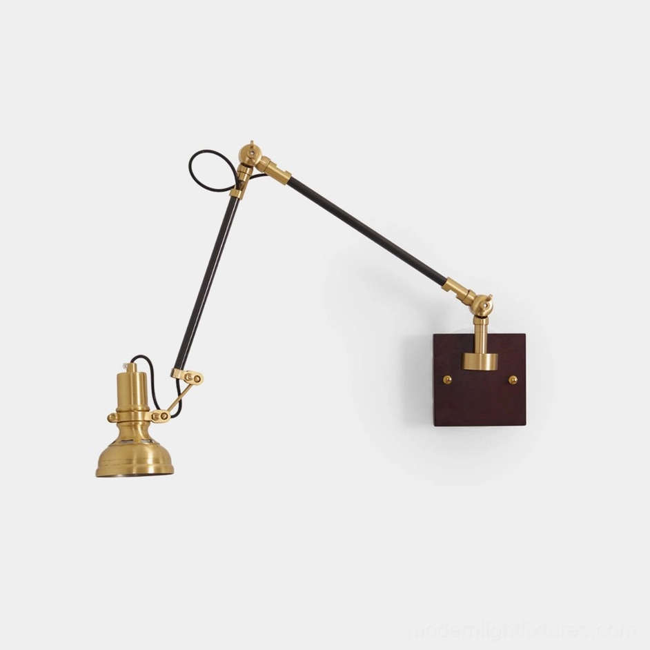 Kane brass and walnut swing arm wall sconce front view with adjustable arm on white background