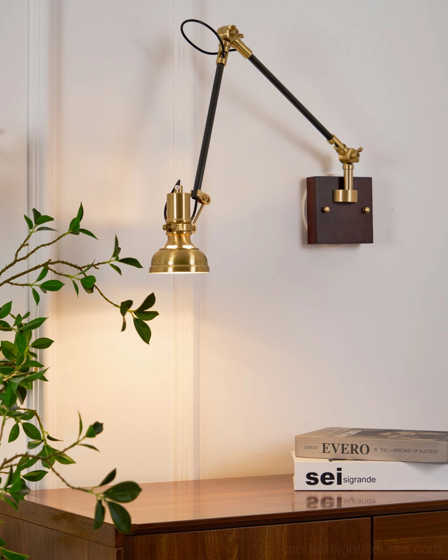 Kane swing arm wall lamp styled in contemporary home office with focused task lighting