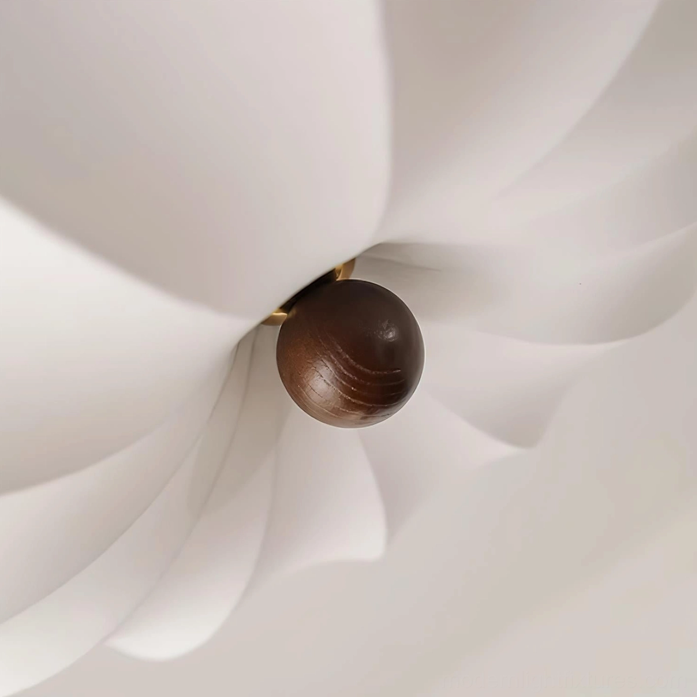 Kateo fabric ceiling light with segmented shade creating artistic shadow patterns in modern interior
