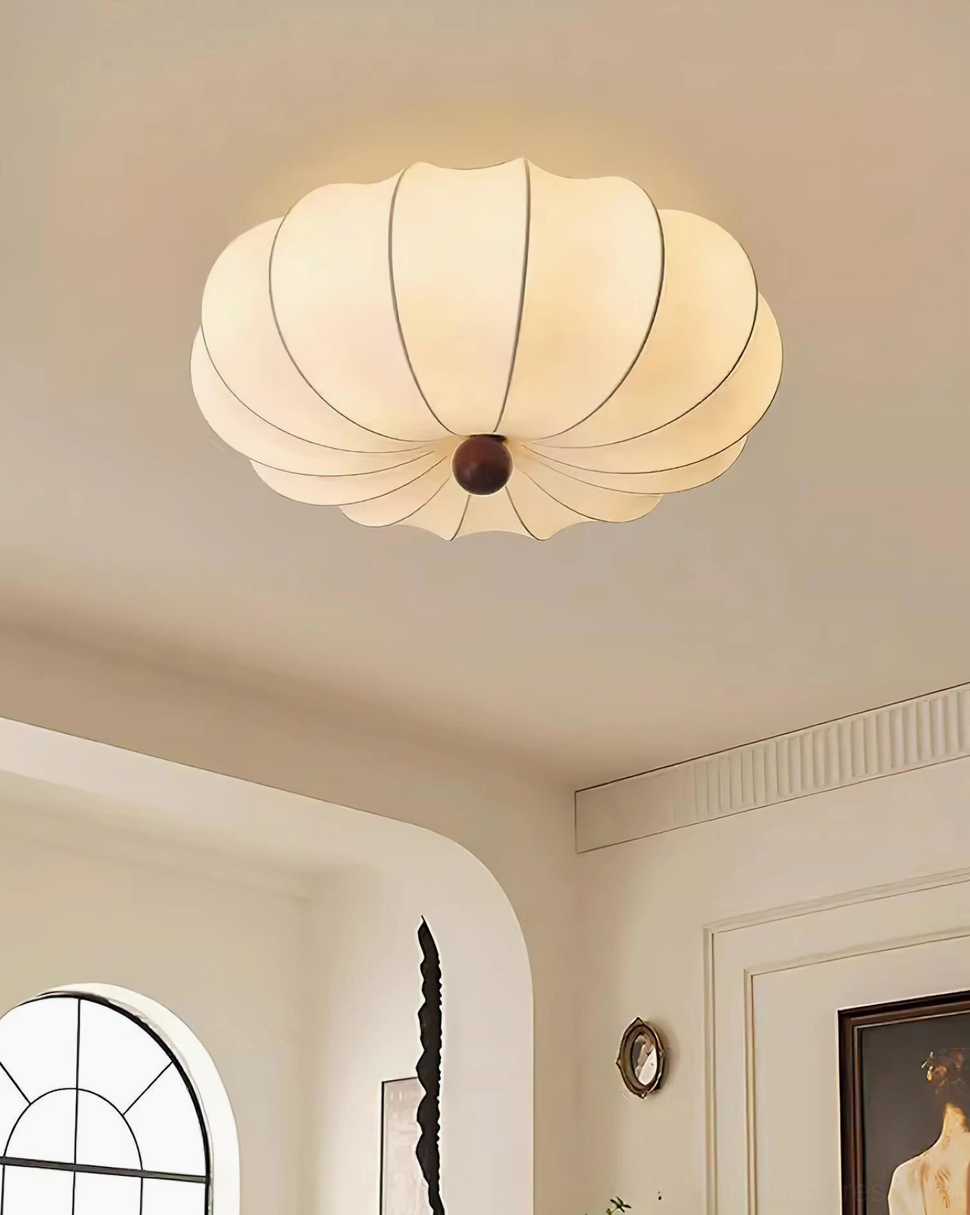 Kateo ceiling light fixture in contemporary kitchen dining area with warm ambient glow and minimalist design