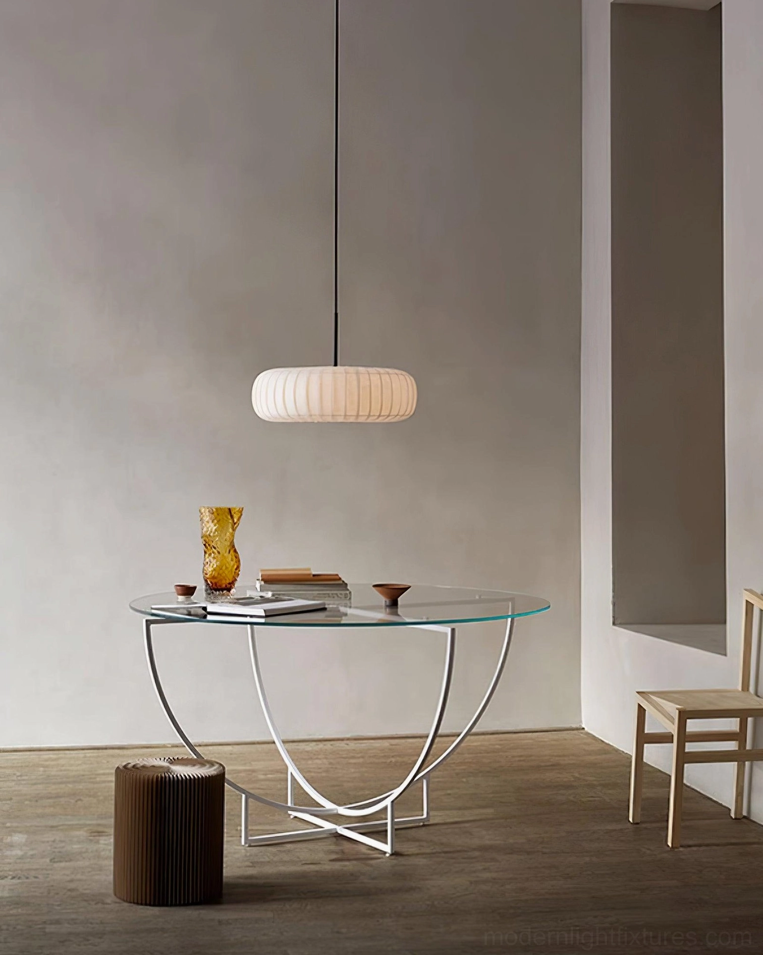 Contemporary fabric pendant light with ribbed oval shade in minimalist study area