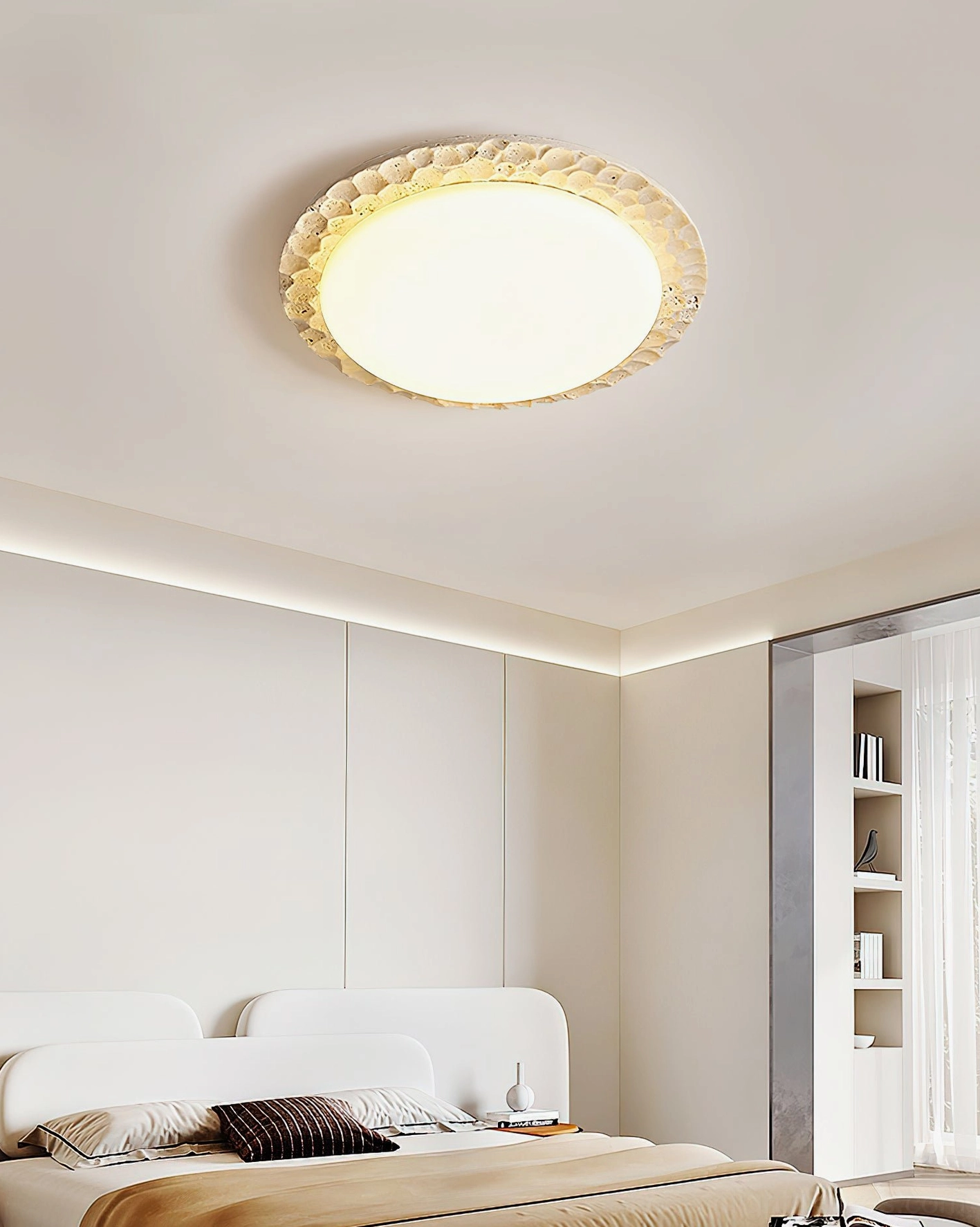 Modern bedroom ceiling view with Kauai travertine flush mount light fixture in contemporary neutral interior