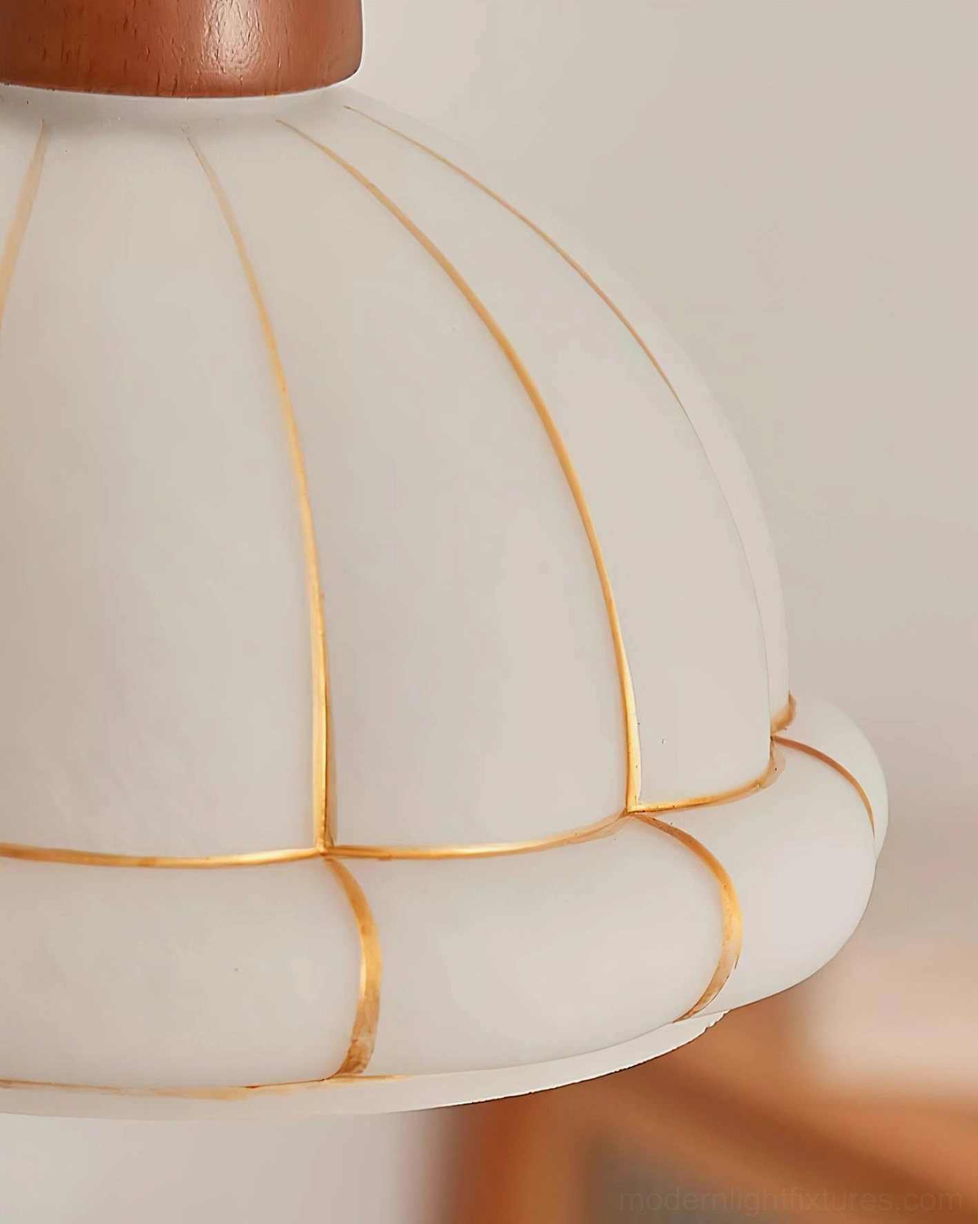 Kaya mid-century pendant light fixture with warm white glass and walnut elements, lifestyle product image