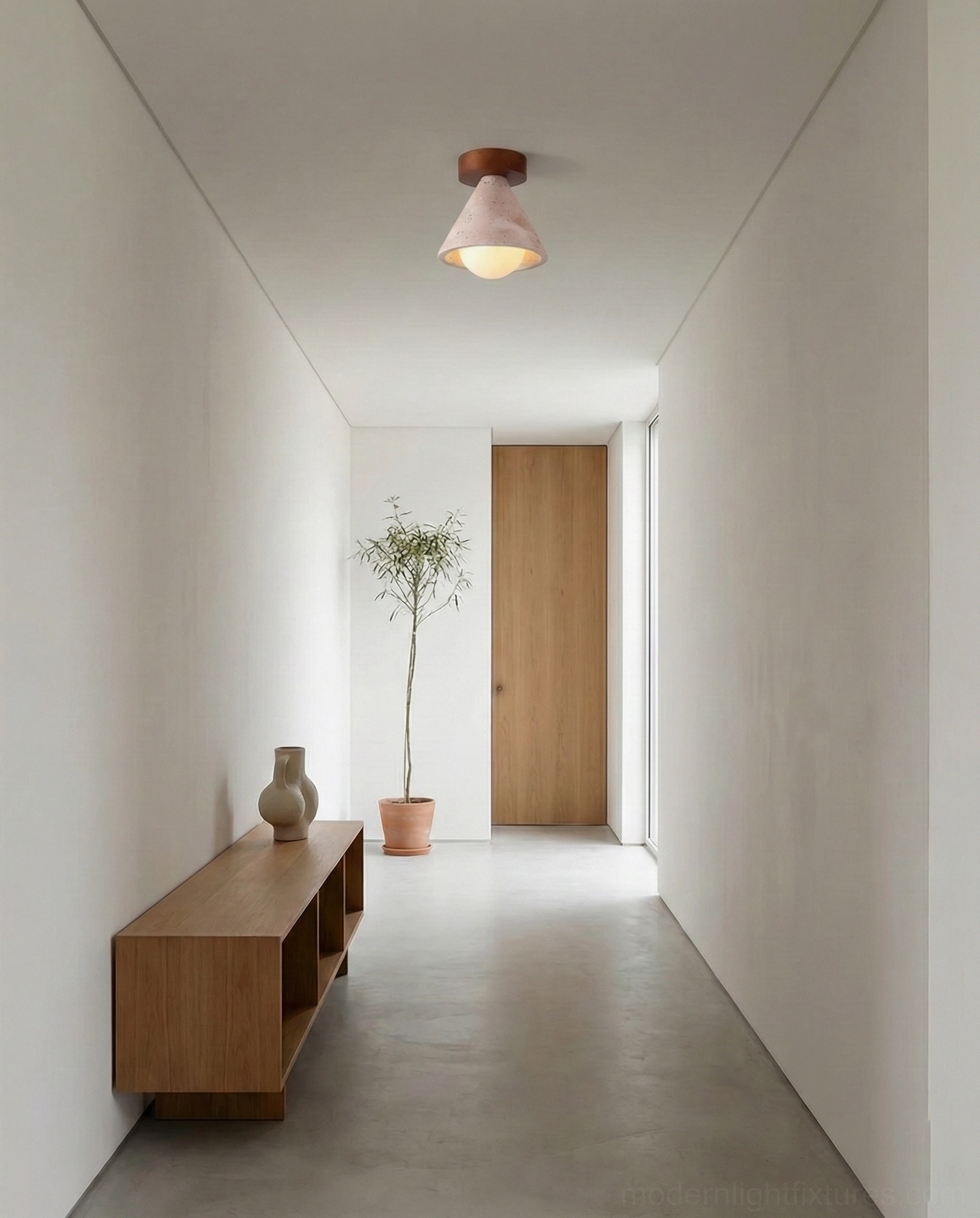 Kayla modern ceiling fixture in long minimalist hallway with wooden bench and potted plant