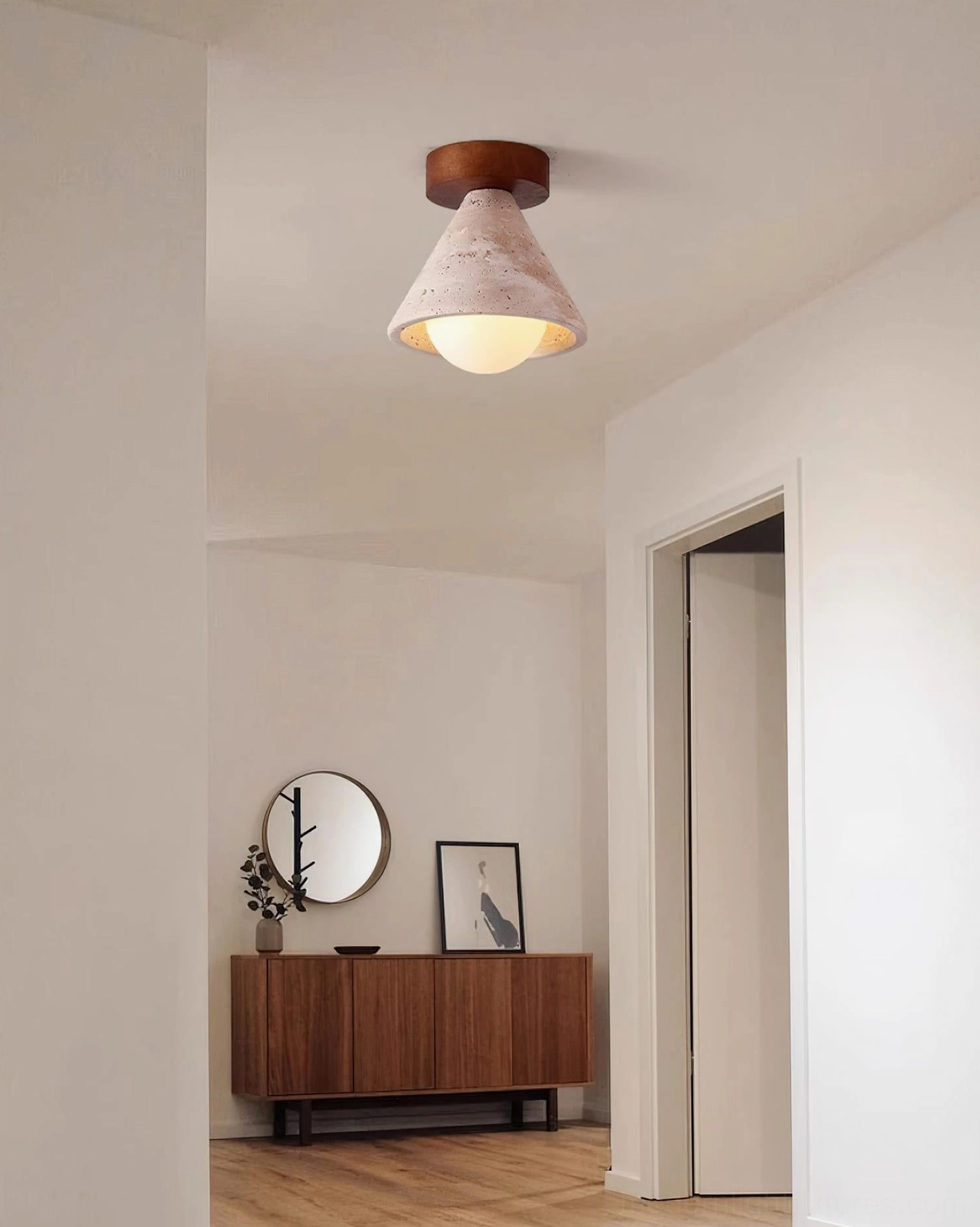 Kayla natural travertine ceiling fixture demonstrating diffused warm light quality