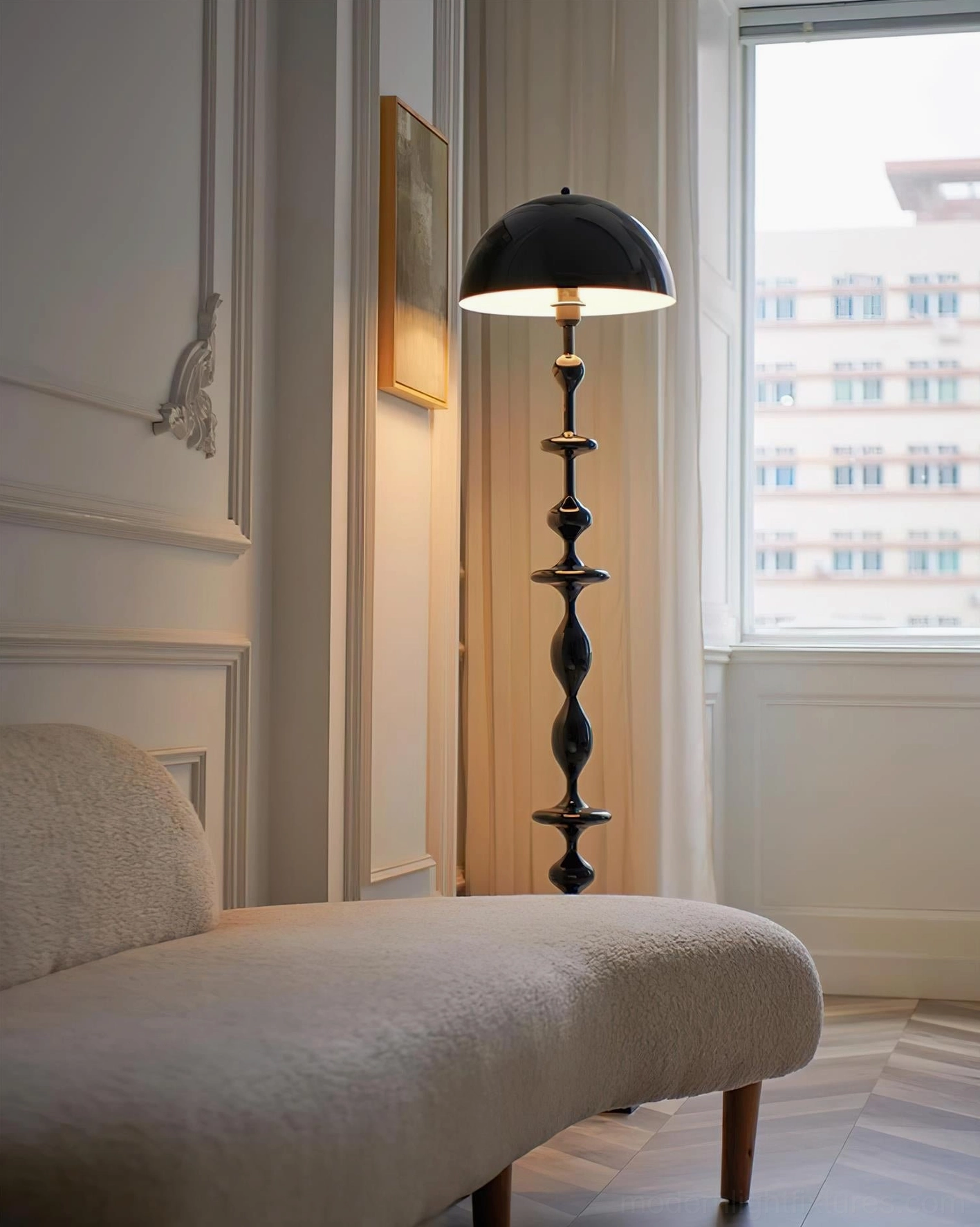 Keira sculptural floor lamp creating warm ambient light atmosphere in contemporary minimalist interior space