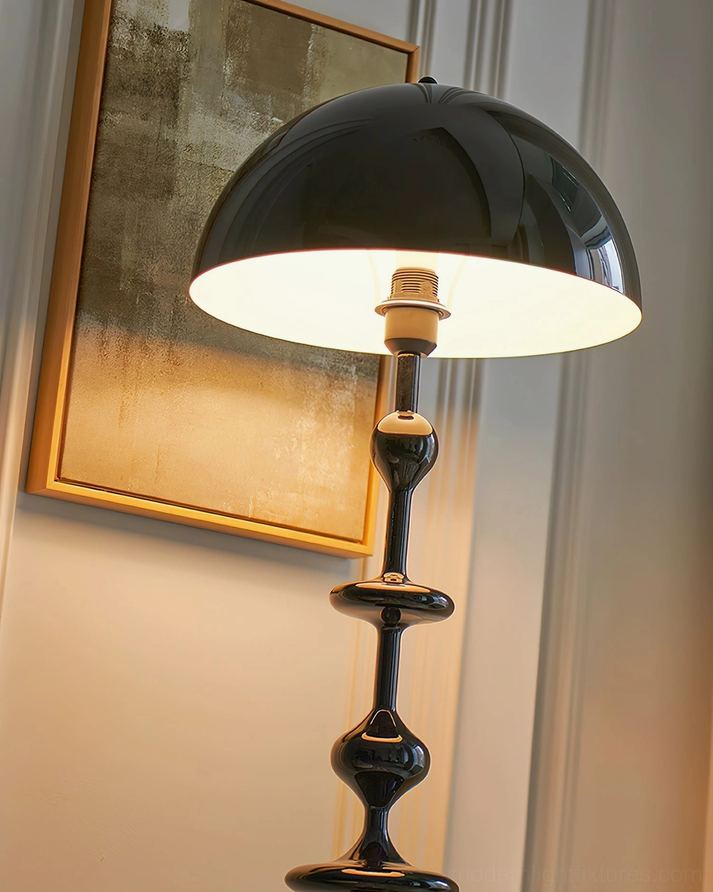 Keira modern sculptural floor lamp detail showing stacked bulbous metal curves and reflective dome shade design