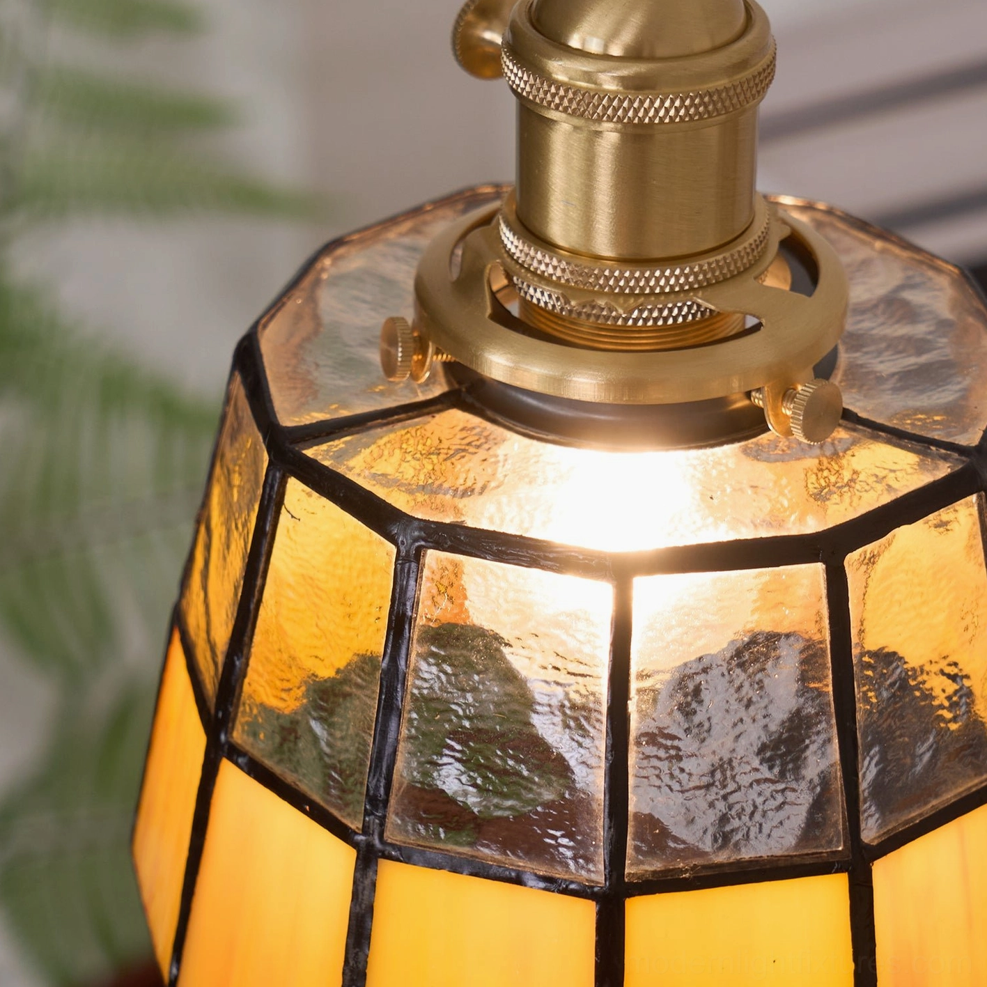 Keito pendant lamp hardware close-up showing brass threaded lamp holder and glass fixtures