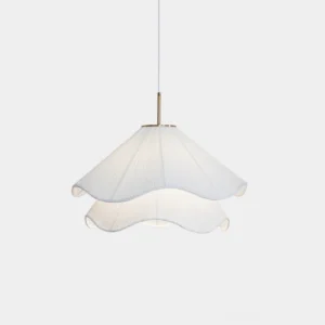 Kendra pleated pendant light with double-layer white fabric shade and brass suspension hardware, modern minimalist design in studio setting