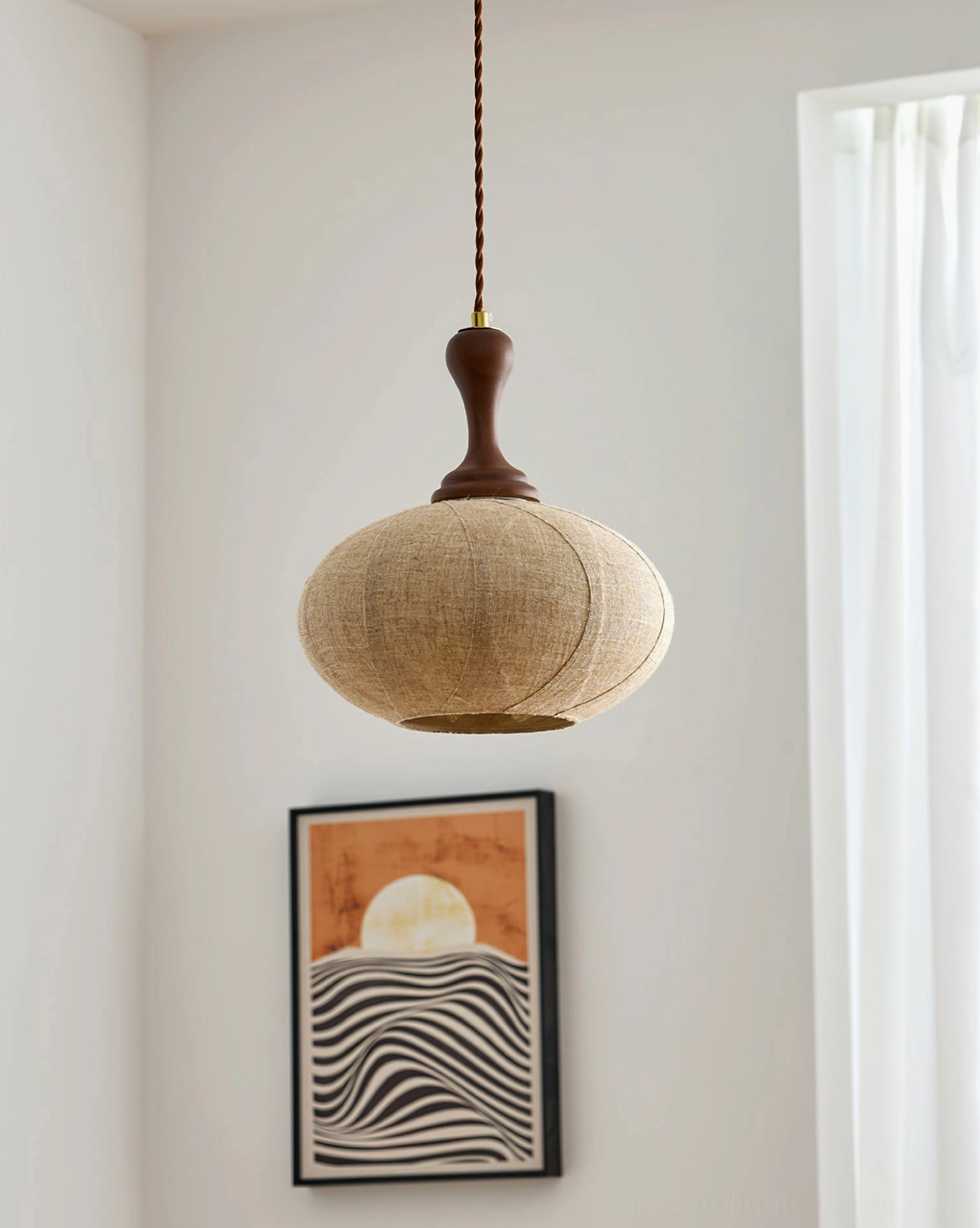 Unlit fabric pendant light side profile view with walnut wood fixture and oval linen shade
