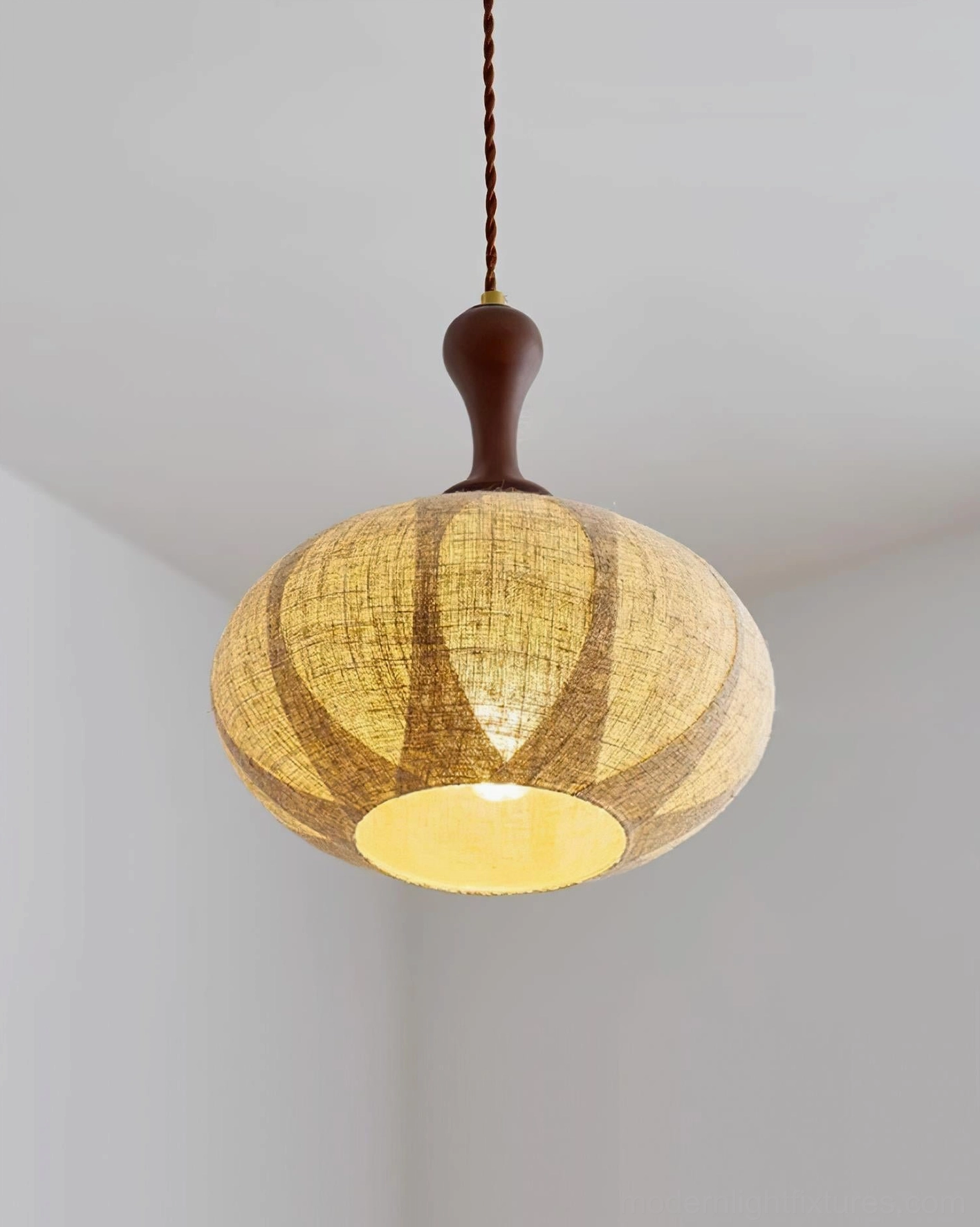 Kenso linen pendant light installed in modern interior residential space with ambient lighting