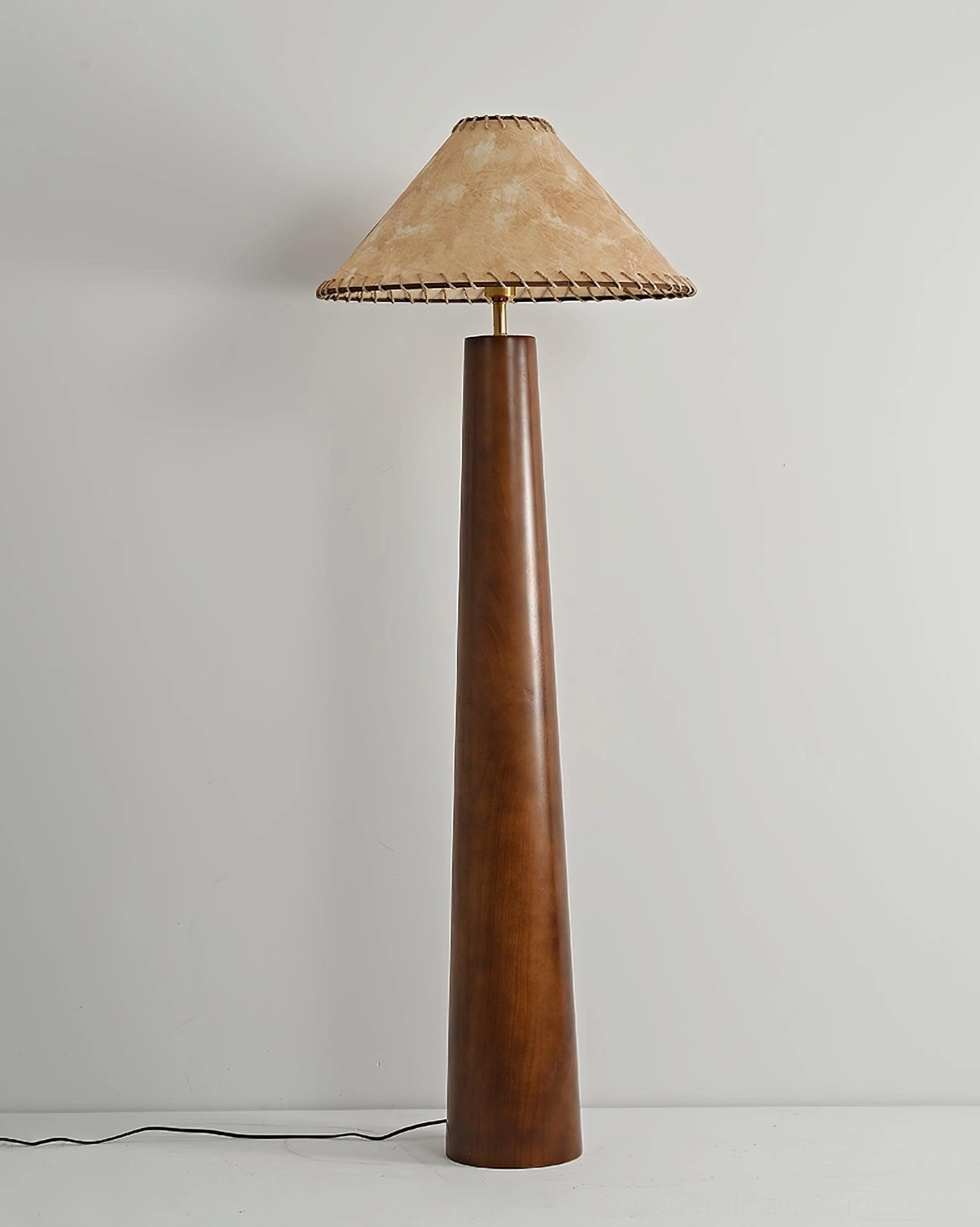 Kibo mid-century modern wood floor lamp showing tapered wooden pole and conical shade silhouette