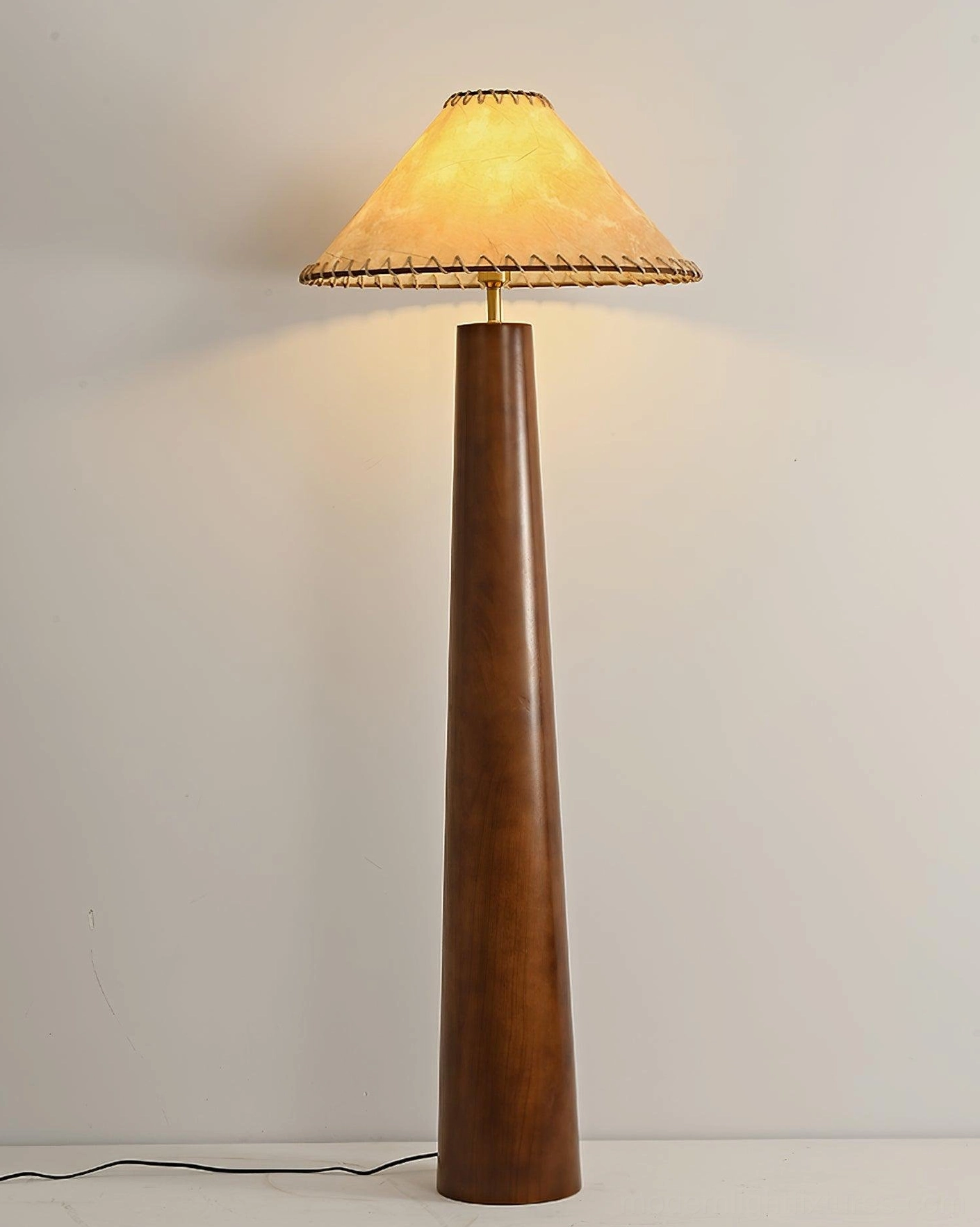 Kibo wooden floor lamp with solid walnut pole and beige jute shade, front studio shot with light background