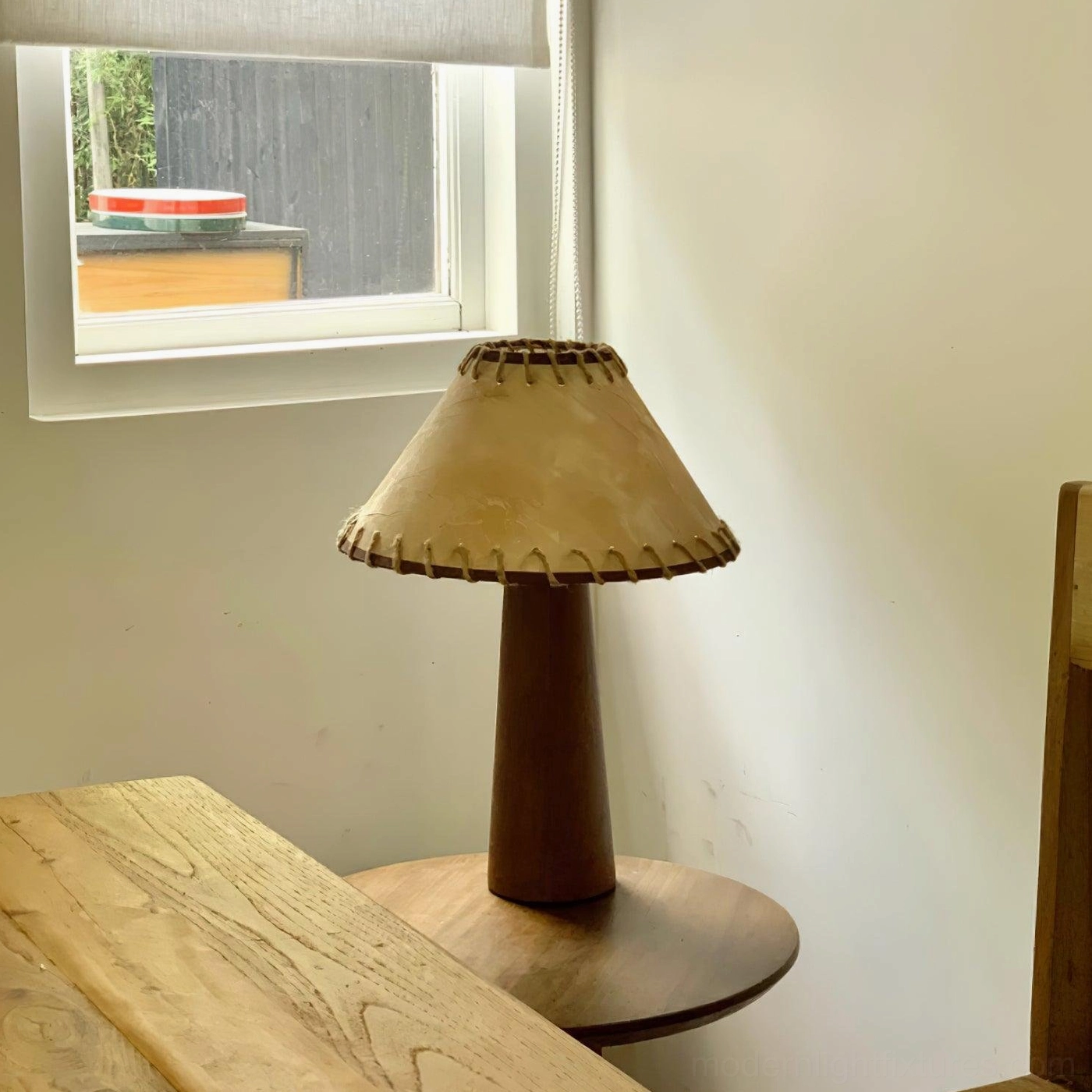 Kibo wood table lamp in eclectic bohemian interior with global design elements and natural decor pieces
