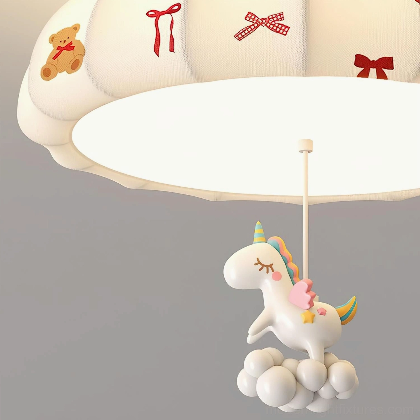 Pumpkin ceiling lamp with warm white glow illuminating children's playspace, showing fabric shade with bear and bow print details