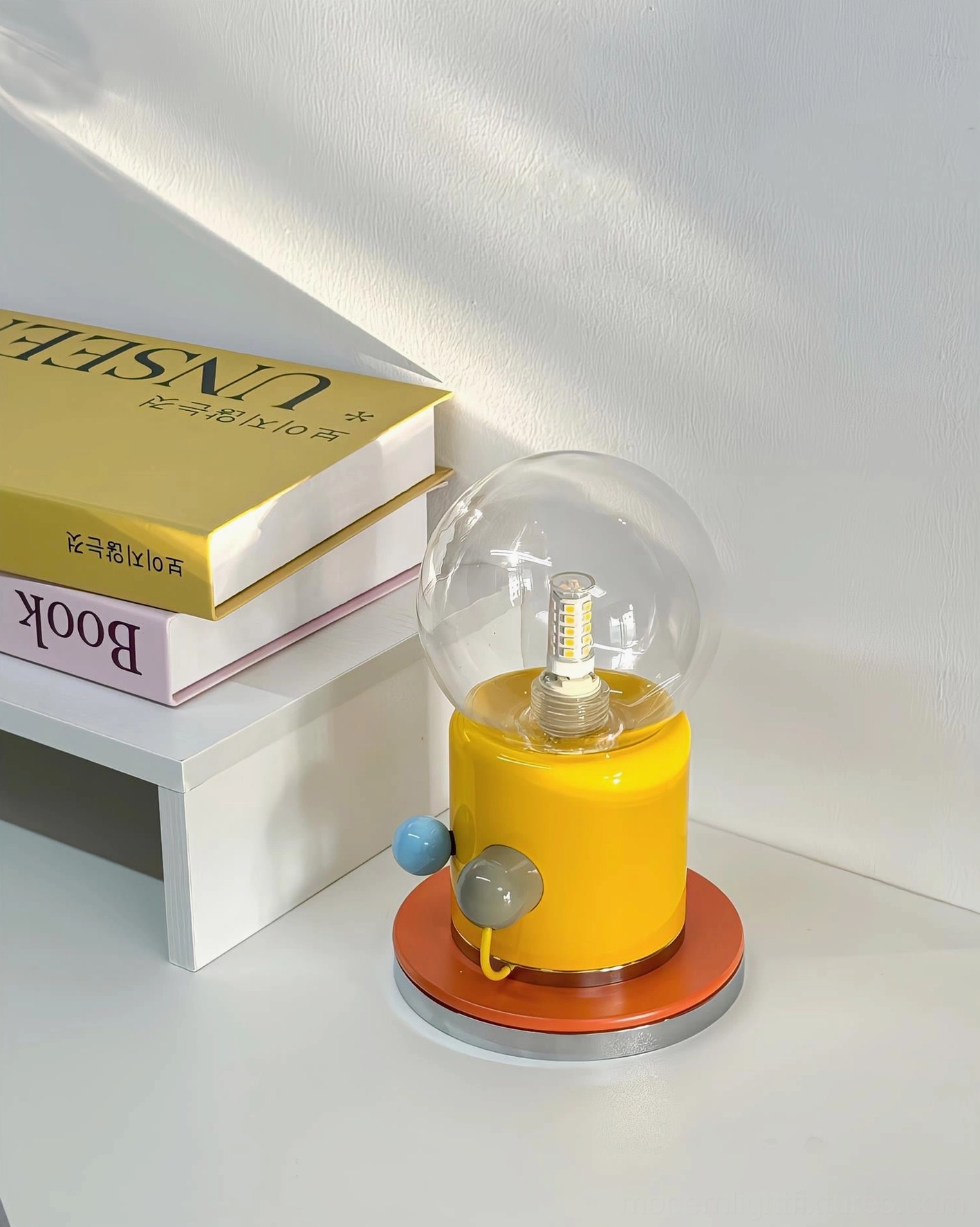 Kiely playful design table lamp with vibrant base and frosted shade contemporary style