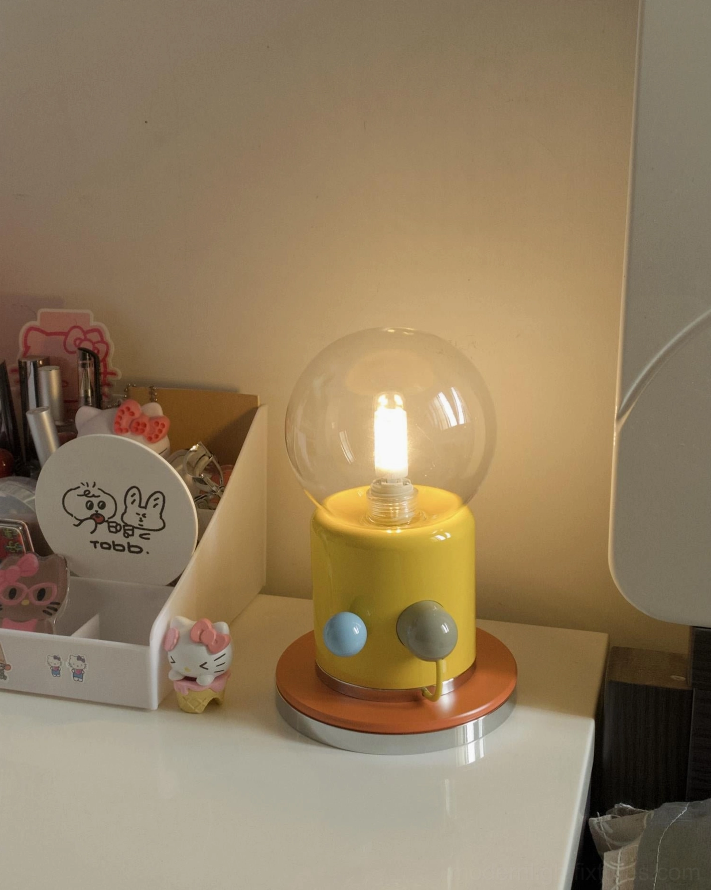 Kiely touch control table lamp with yellow ceramic cylindrical base lighting feature