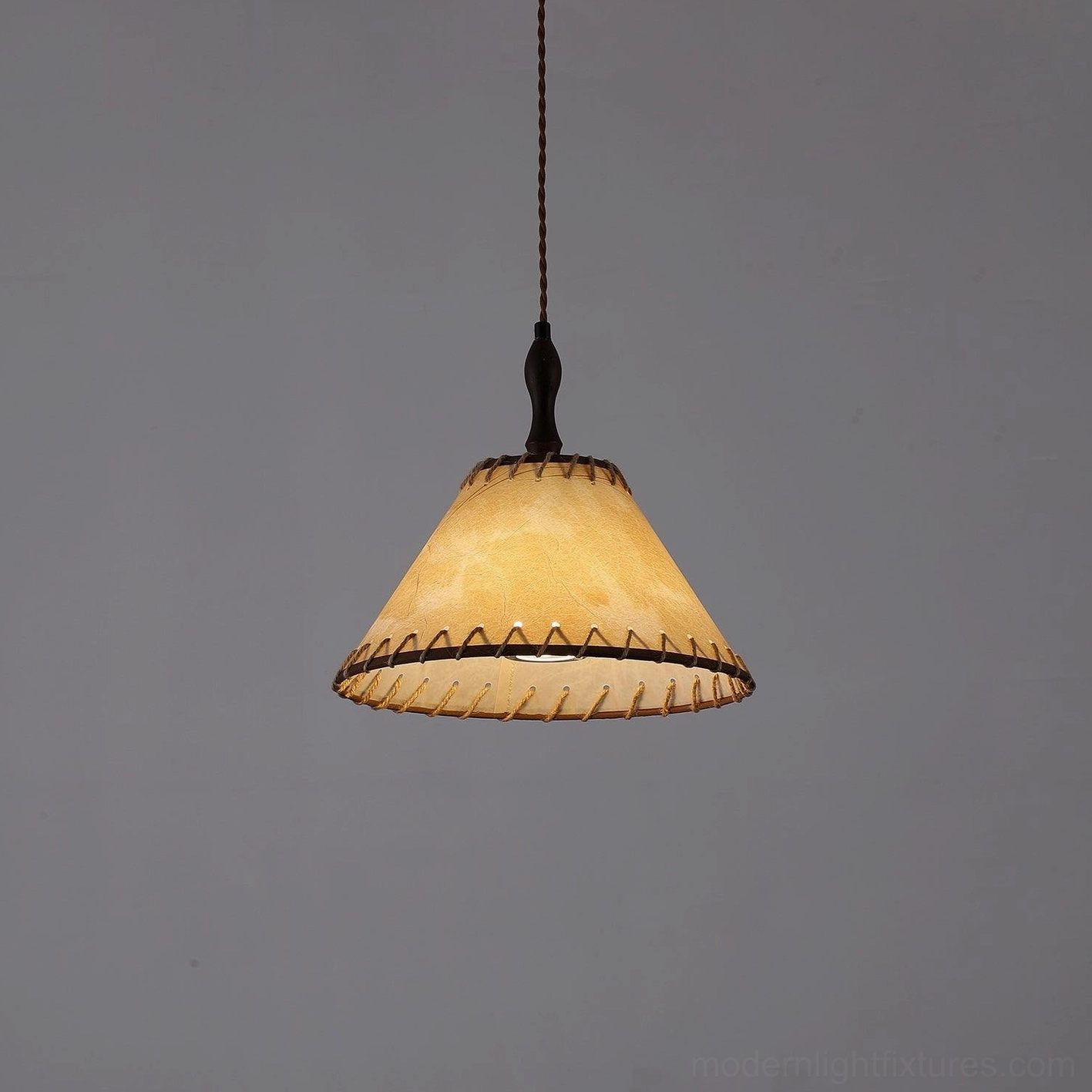 Kiko handcrafted linen pendant lamp with conical shade design and artisanal stitching