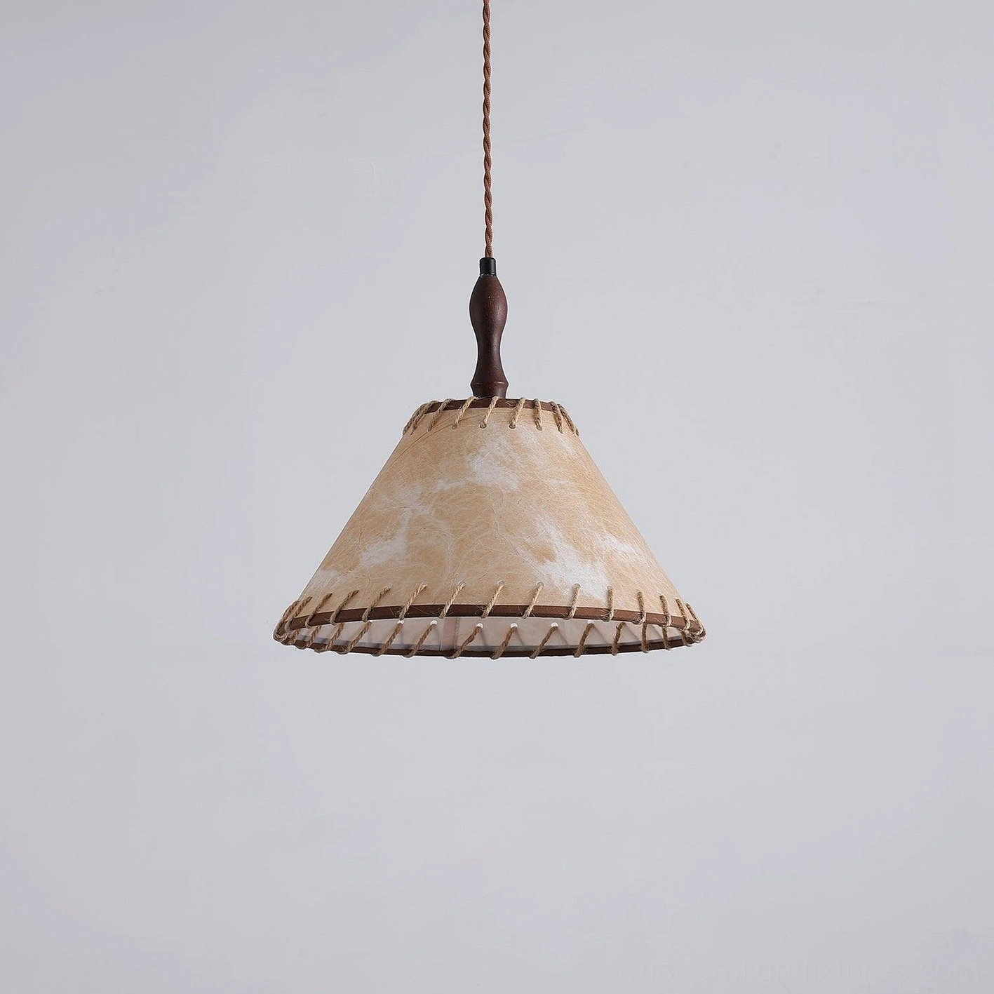Kiko linen fabric pendant light with stitched rope trim detail in studio photography