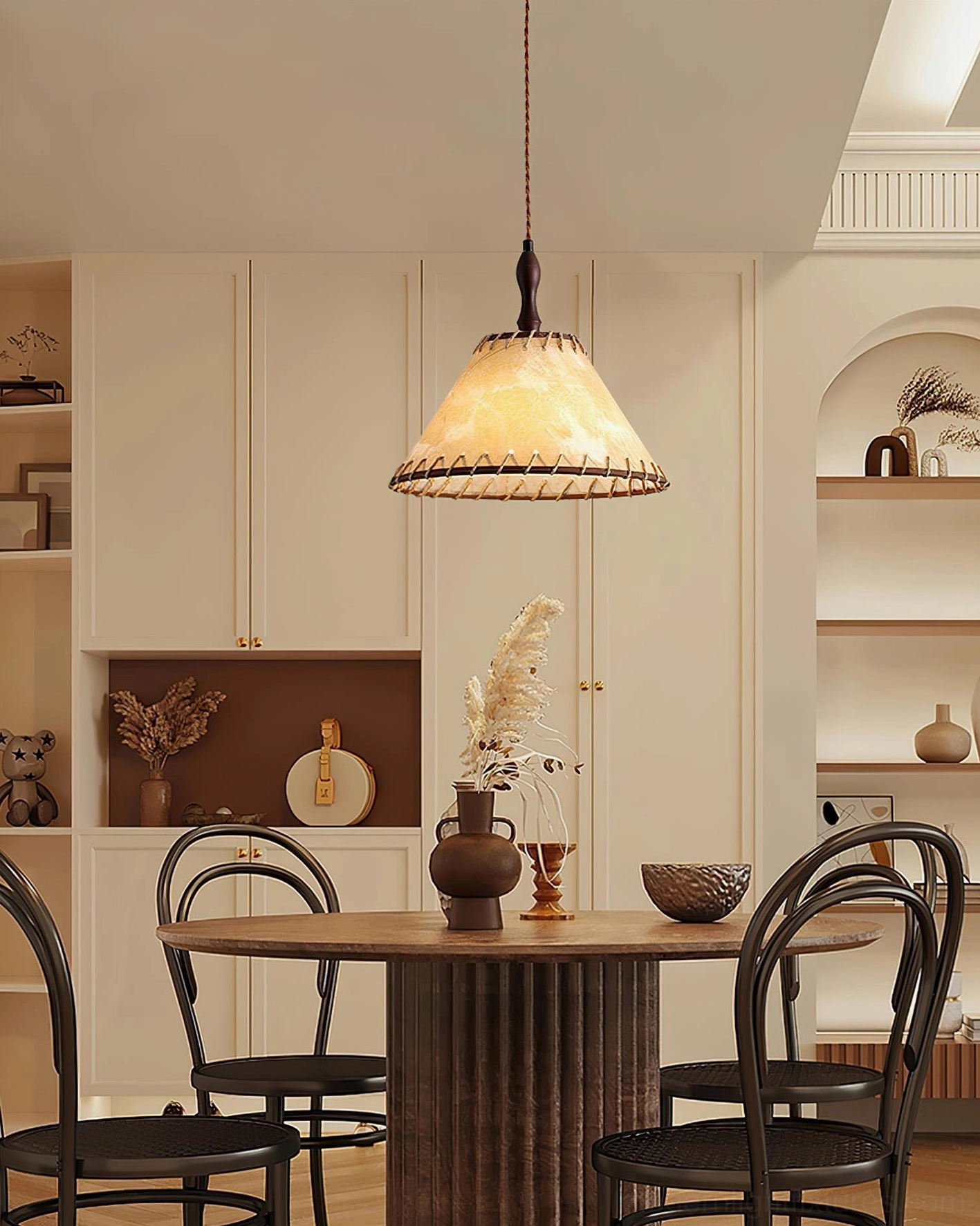 Kiko fabric pendant light suspended over modern round wooden dining table in contemporary room
