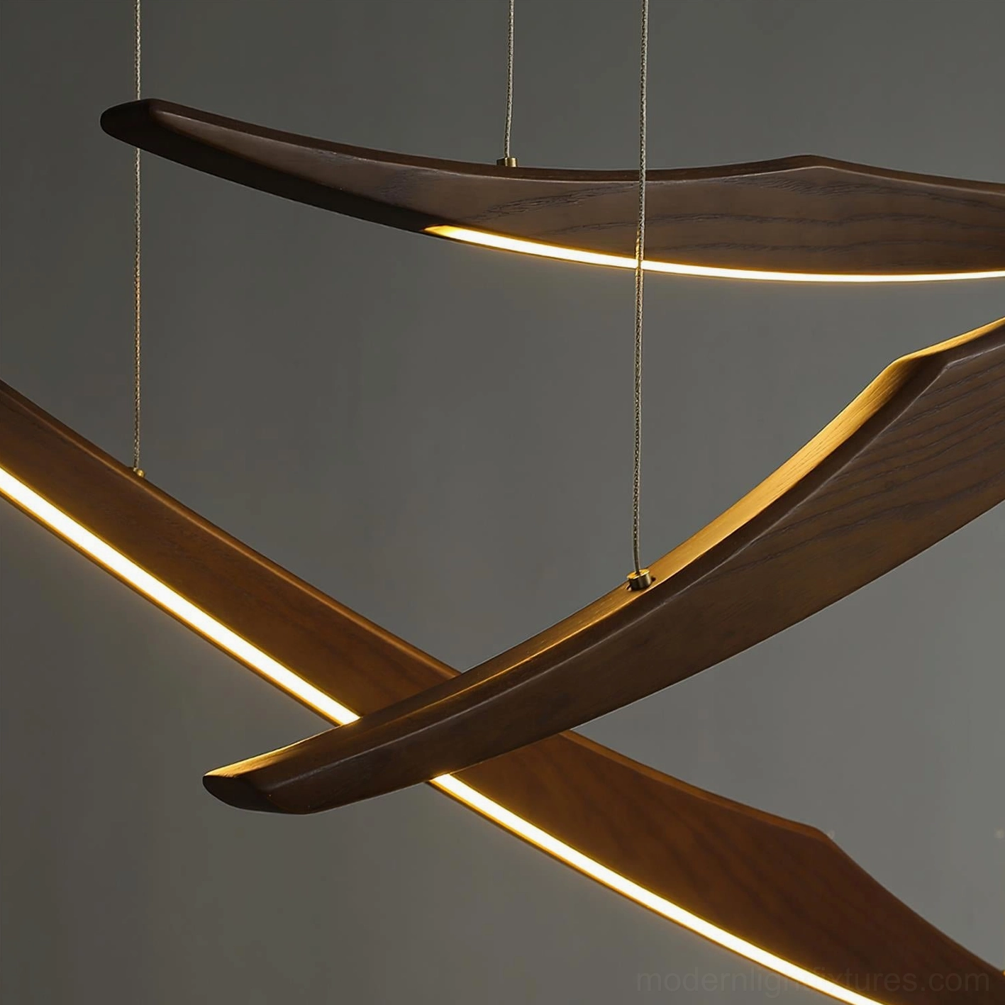 Kinetic arc chandelier artistic view showing motion-inspired wooden arc design