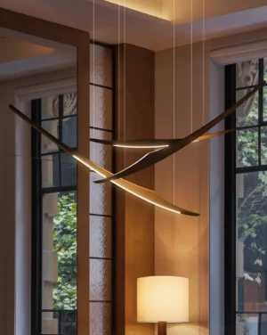 Modern wooden arc pendant chandelier installed in residential room with natural light from windows