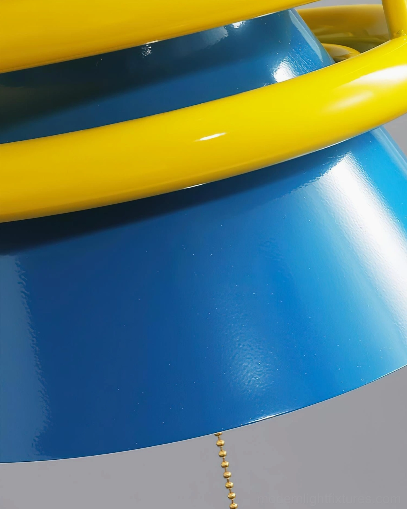 Kinetica contemporary pendant lamp in neutral studio setting showcasing bold color blocking and retro-futuristic design aesthetic