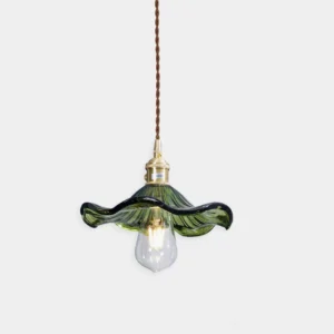 Kinney fluted green glass pendant lamp with brushed brass flower-shaped fixture on white background