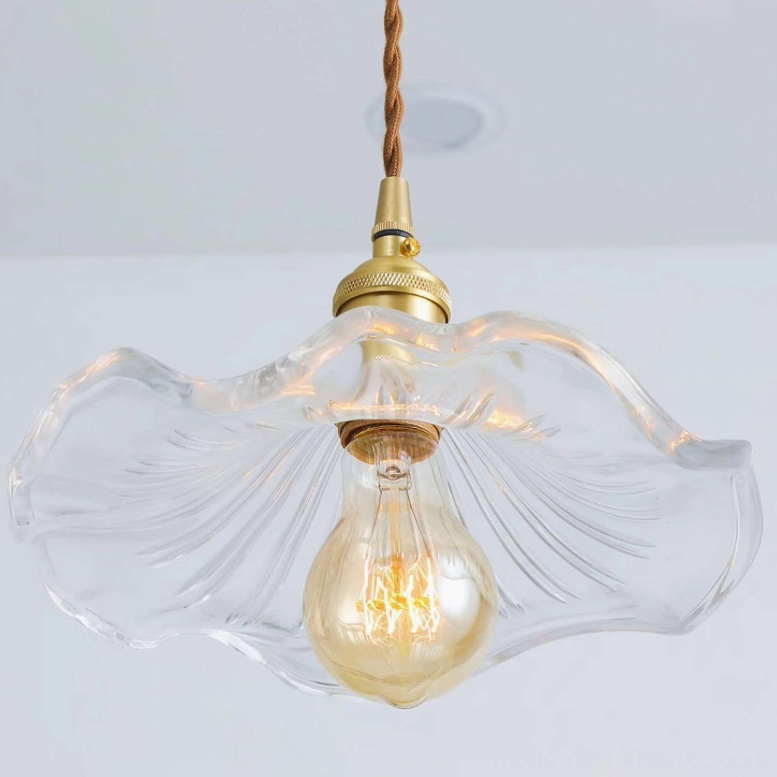 Kinney pendant light showing brass cable connector and adjustable suspension length