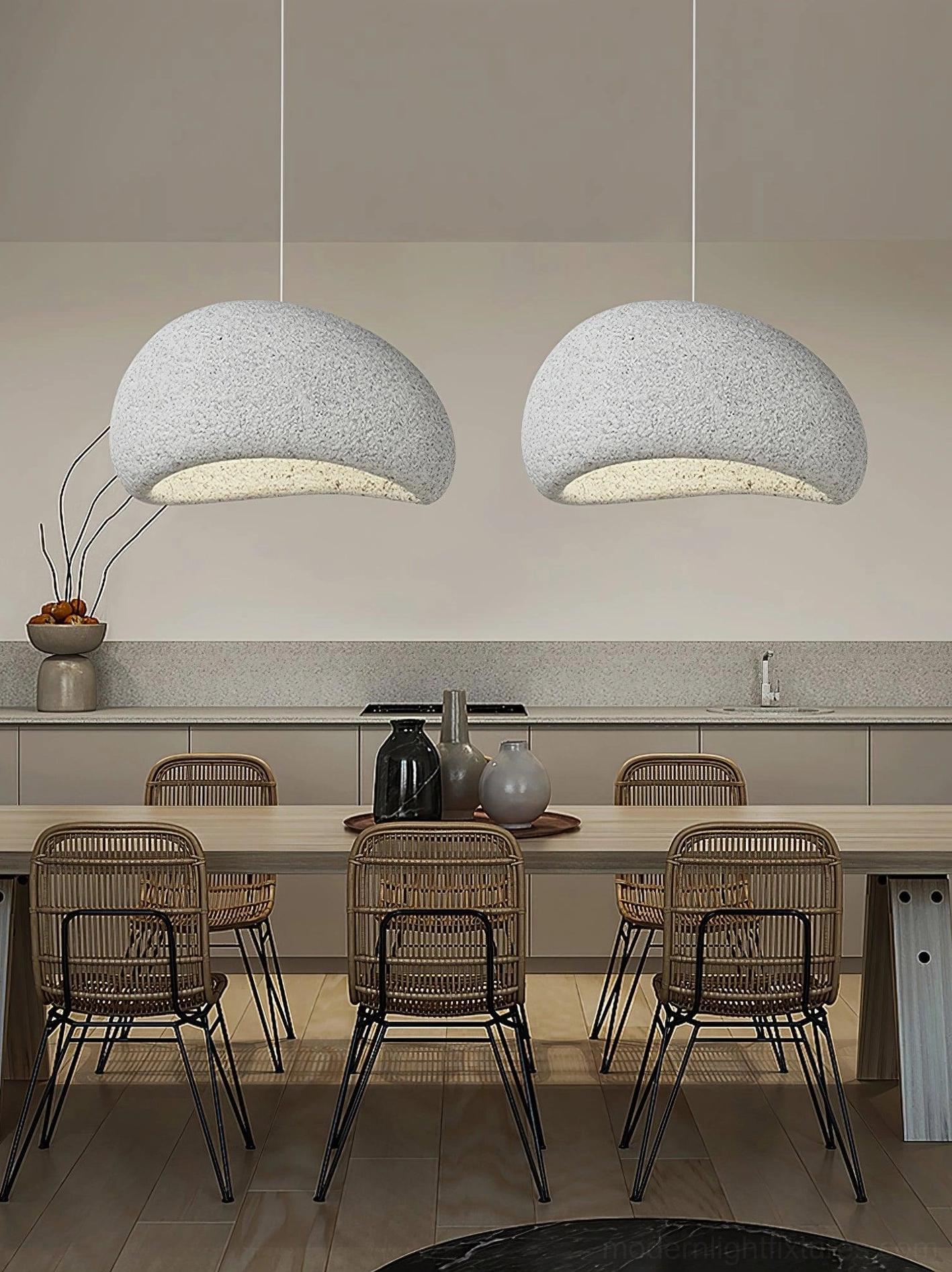 Two Kioto light grey speckled pendant lamps providing task lighting in modern kitchen-dining space
