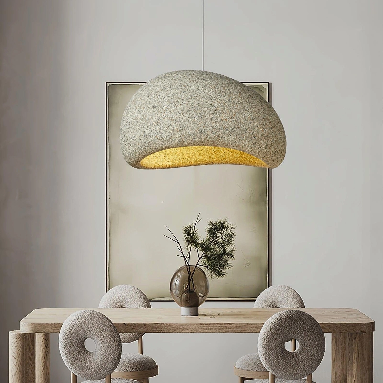 Kioto pendant light suspended in rustic modern dining room with neutral warm tones and wabi-sabi aesthetic