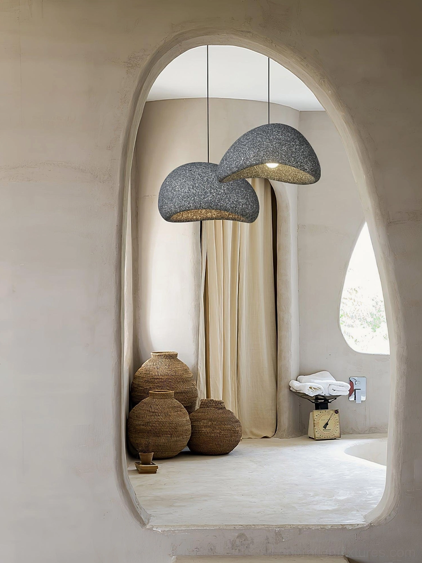 Kioto speckled pendant lamp showing architectural silhouette and sculptural design form