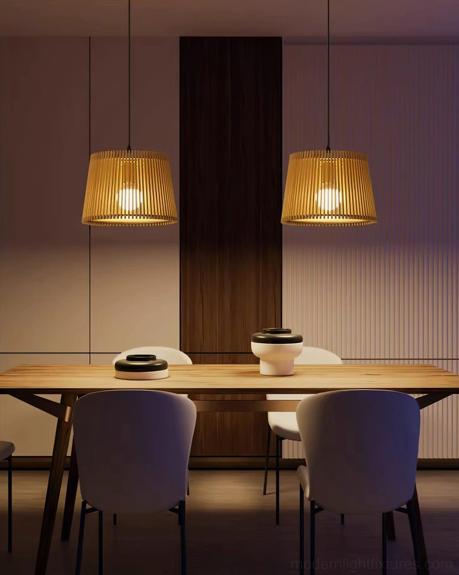 Two Kitami wooden slat pendant lights above dark wood dining table with contemporary chairs