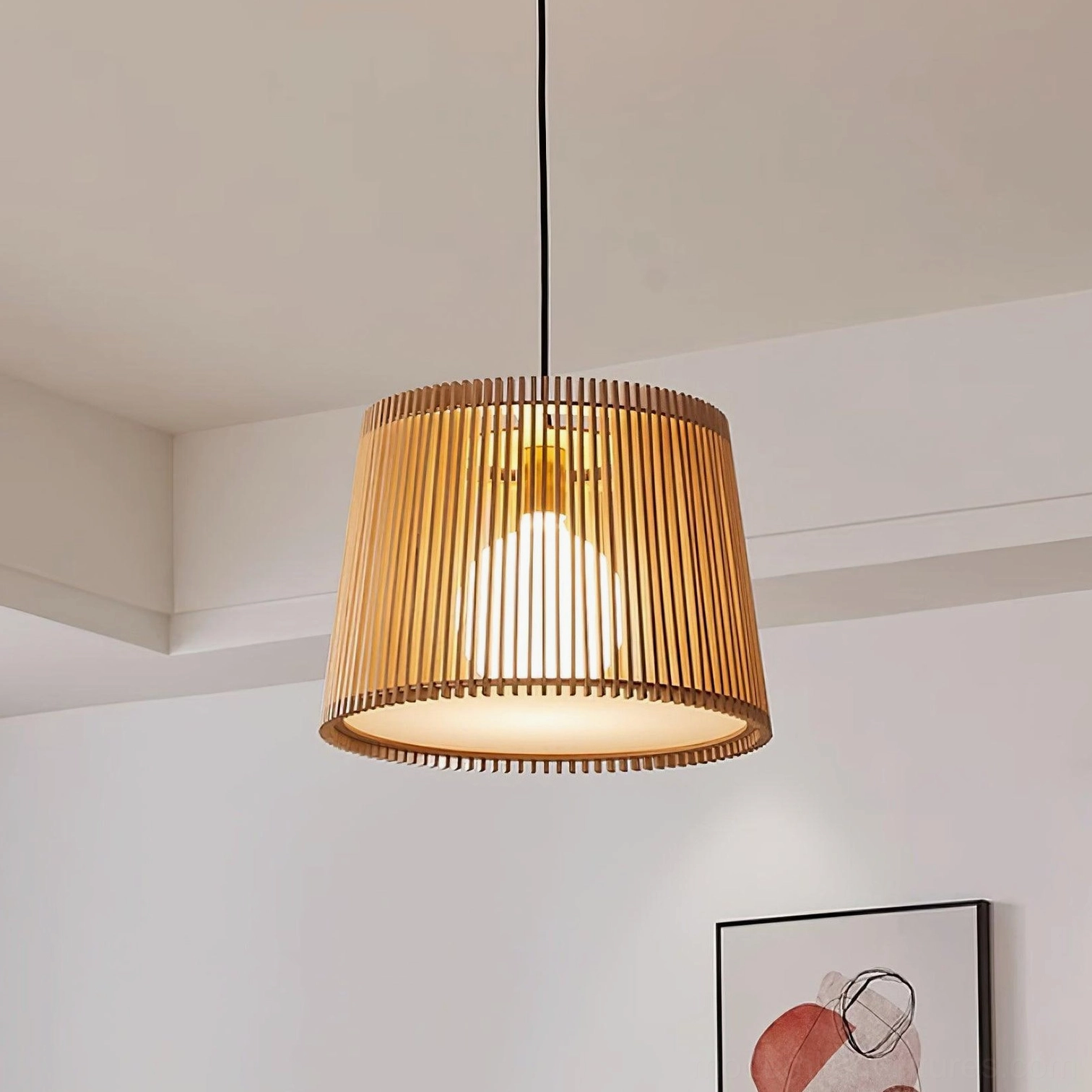 Kitami pendant light detail showing wood slat construction and interior bulb housing
