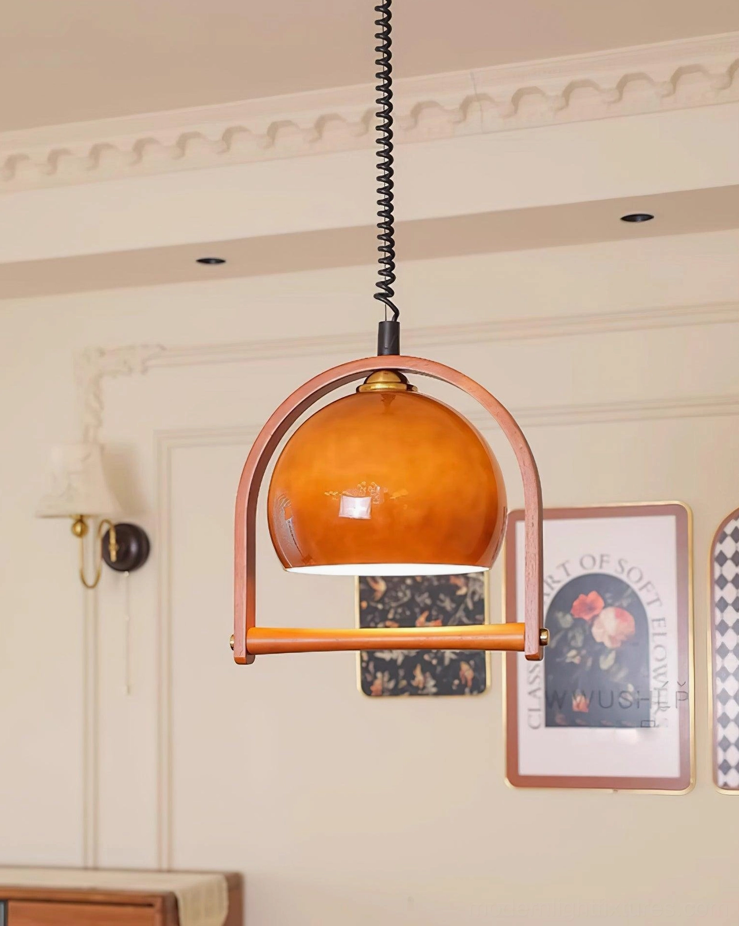 Kleine pendant lamp showing adjustable stretchable cord mechanism and suspension system