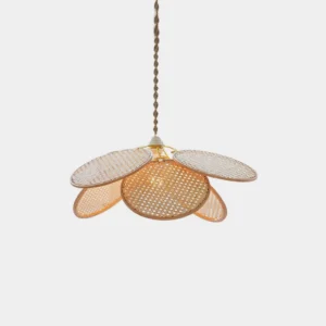 Kloe handwoven rattan petal pendant lamp overhead studio view showing natural woven texture and flower-inspired silhouette