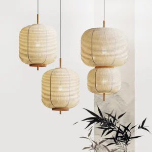 Assorted sizes of Komorebi japandi pendant lights on display with bamboo backdrop, showcasing small and large diameter options