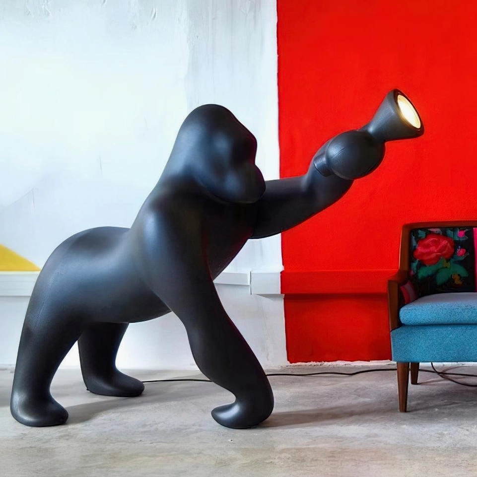 Kong floor lamp in contemporary Art Deco revival interior with bold geometric forms and dramatic lighting presence