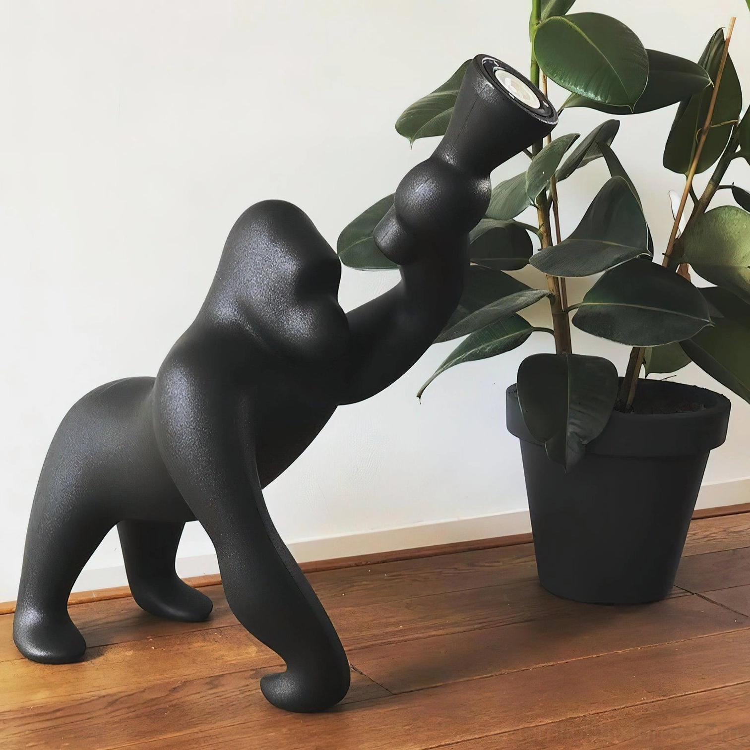 Kong sculptural floor lamp in creative home office setting, inspiring productivity and serving as statement piece for design-forward workspace