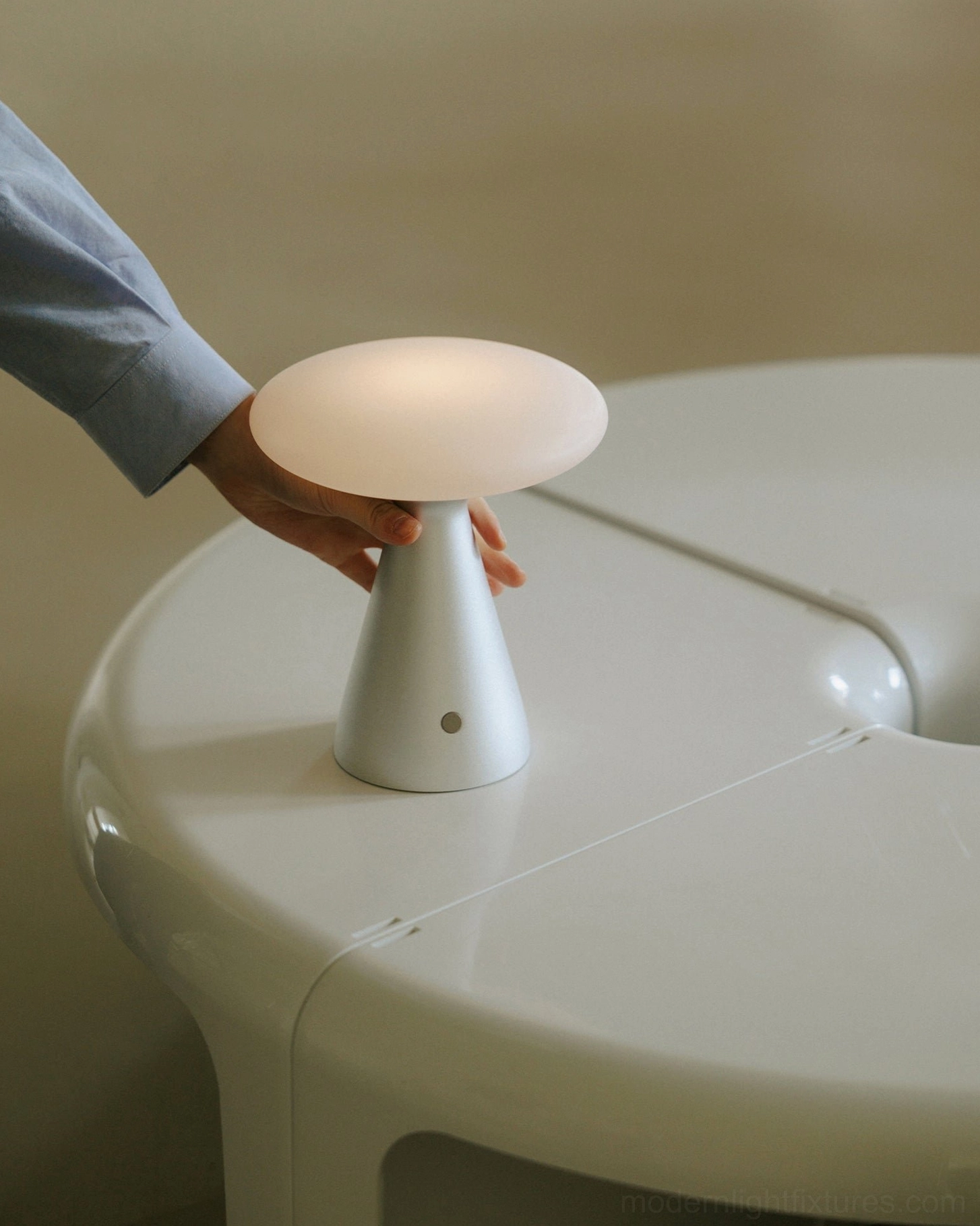 Konos table lamp with integrated USB charging port at aluminum base - tech-forward minimalist workspace accessory
