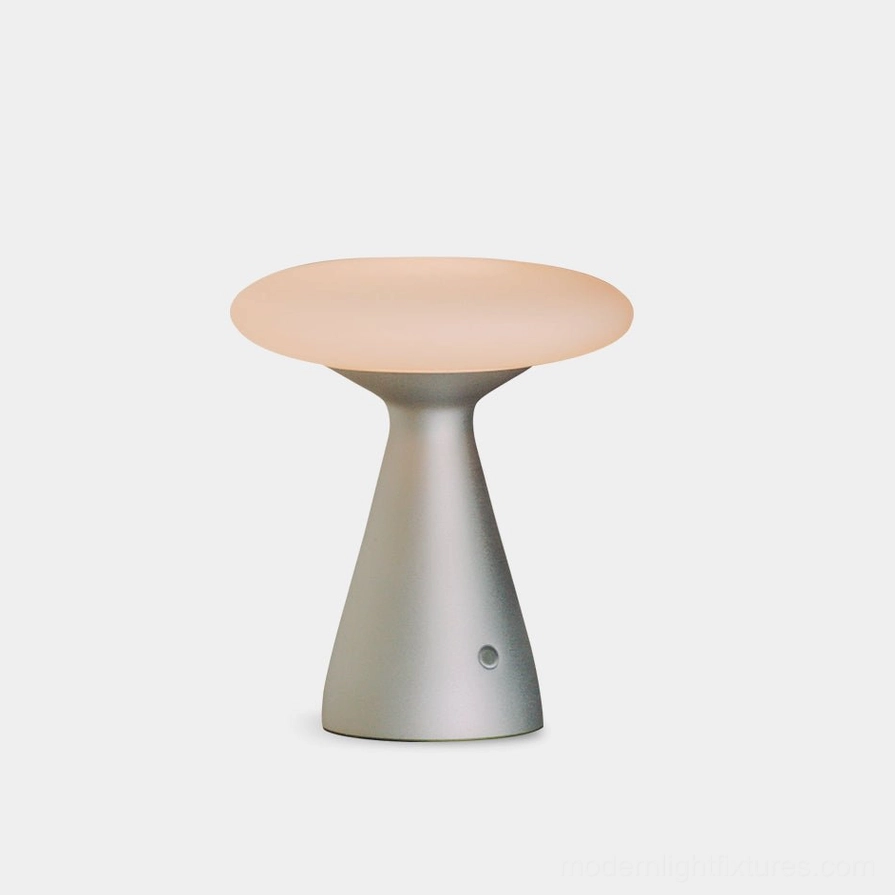 Konos minimalist mushroom table lamp with matte silver aluminum base and frosted white glass diffuser - front view on white studio background