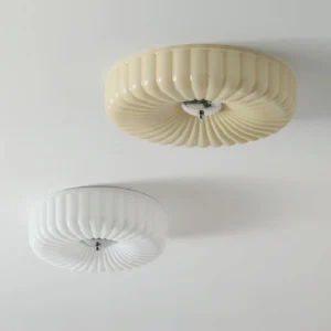 Two Kranos ceiling lights in beige and white, side-by-side comparison of color finishes and fluted glass design