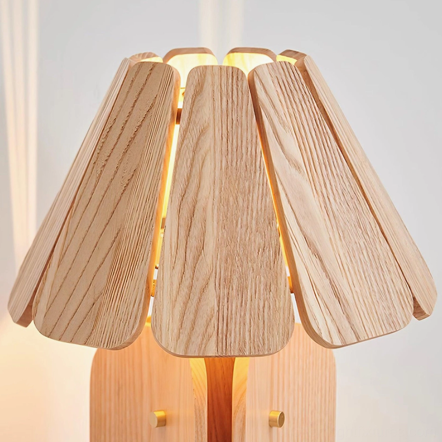 Kubec wooden table lamp in home office desk setting providing warm task lighting