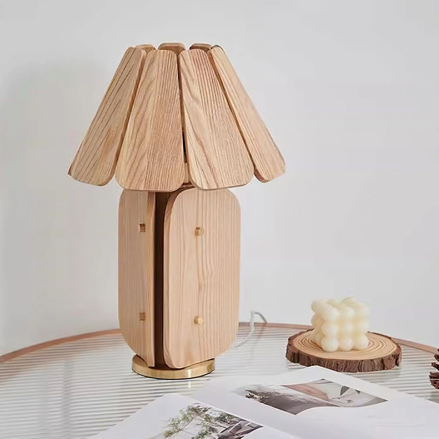 Kubec wooden table lamp creating layered lighting in living room ambiance design