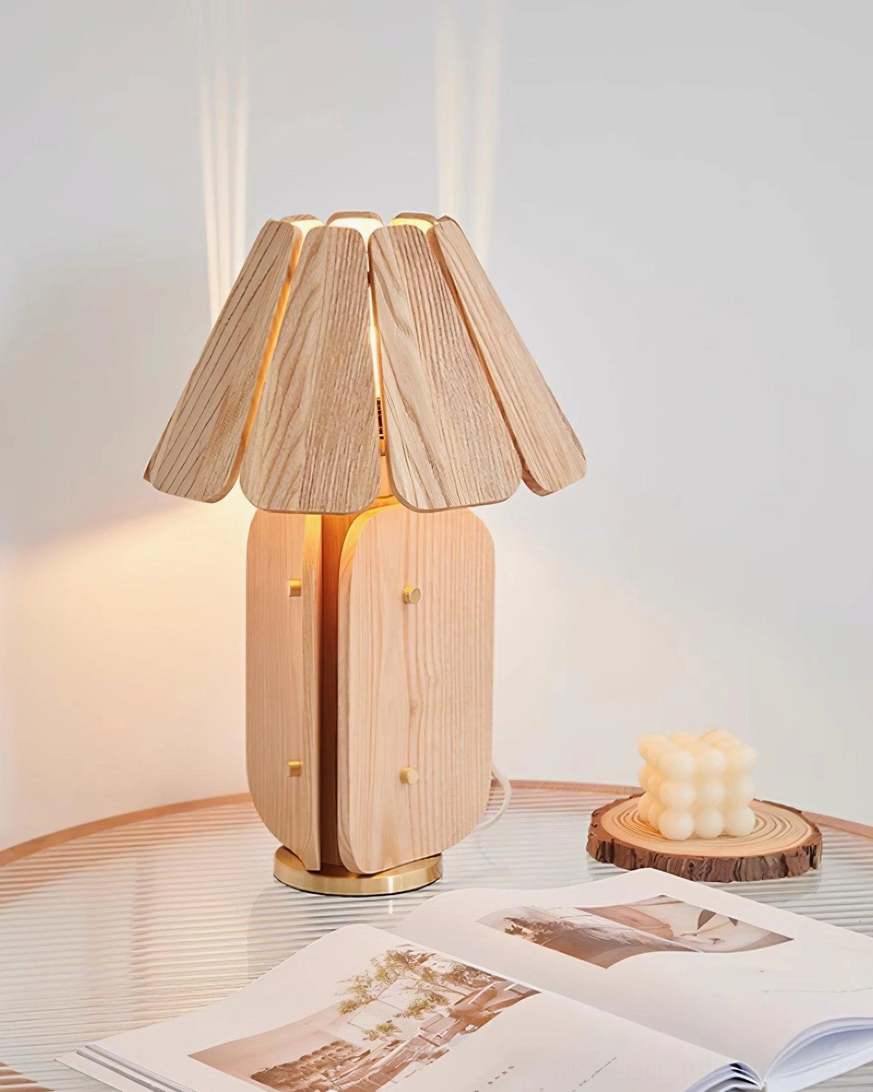 Kubec table lamp styled with decorative books and vintage home accents