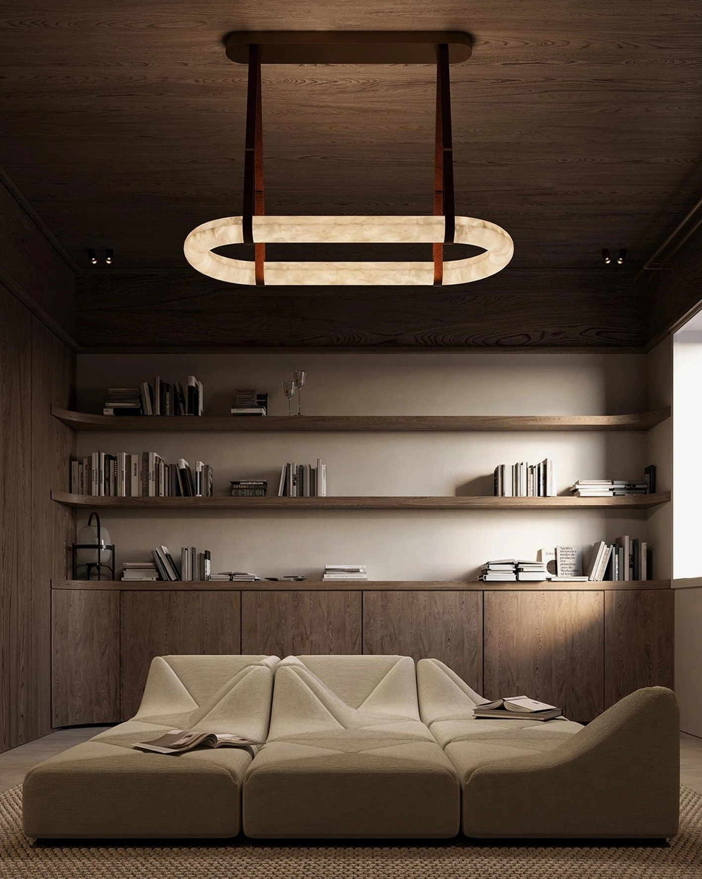 Single oval alabaster pendant light overhead view in modern lounge interior with wooden shelving and warm minimalist decor